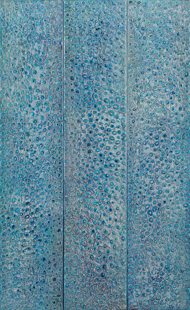 blue and turquoise background with small pebbles of dark blue evoking water droplets on a flat surface, work is divided in thirds vertically.